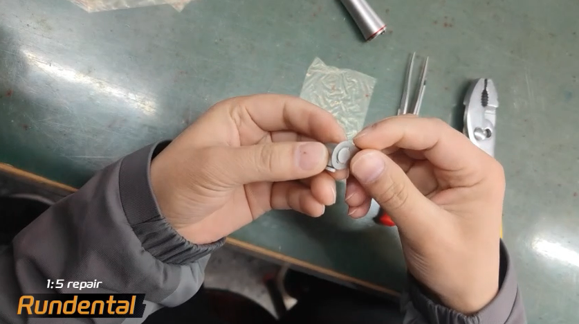 Using the wrench included in the original contra anlge box, rotate the rear cover open